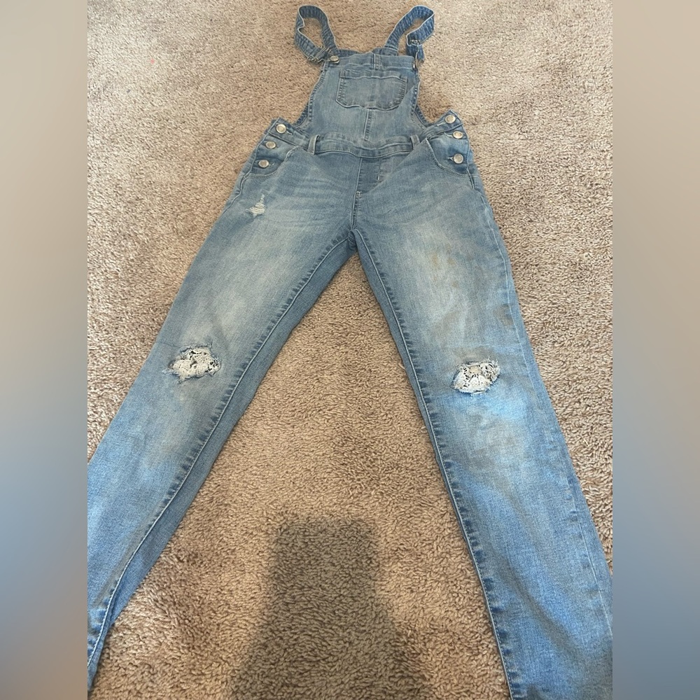 Girls size large (12) overalls with lace knee cuts outs.
